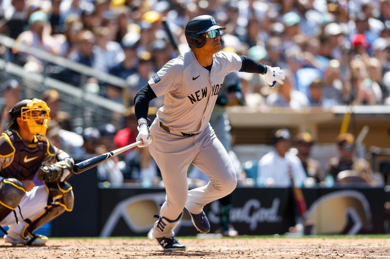 May 26, 2024; San Diego, California, USA; New York Yankees right fielder Juan Soto (22) hits a rbi double in the sixth inning against the San Diego Padres at Petco Park. Mandatory Credit: David Frerker-USA TODAY Sports