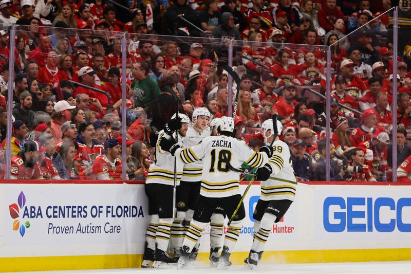 May 6, 2024; Sunrise, Florida, USA; Boston Bruins defenseman Mason Lohrei (6) celebrates with teammates after scoring against the Florida Panthers during the second period in game one of the second round of the 2024 Stanley Cup Playoffs at Amerant Bank Arena. Mandatory Credit: Sam Navarro-USA TODAY Sports