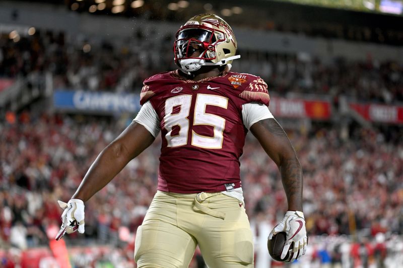 Dec 29, 2022; Orlando, Florida, USA; Florida State Seminoles tight end Markeston Douglas (85) celebrates after scoring a touchdown  in the second half against the Oklahoma Sooners  in the 2022 Cheez-It Bowl at Camping World Stadium. Mandatory Credit: Jonathan Dyer-USA TODAY Sports