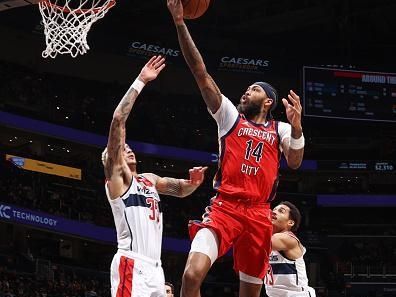 WASHINGTON, DC -? DECEMBER 13:  Brandon Ingram #14 of the New Orleans Pelicans goes to the basket during the game on December 13, 2023 at Capital One Arena in Washington, DC. NOTE TO USER: User expressly acknowledges and agrees that, by downloading and or using this Photograph, user is consenting to the terms and conditions of the Getty Images License Agreement. Mandatory Copyright Notice: Copyright 2023 NBAE (Photo by Stephen Gosling/NBAE via Getty Images)