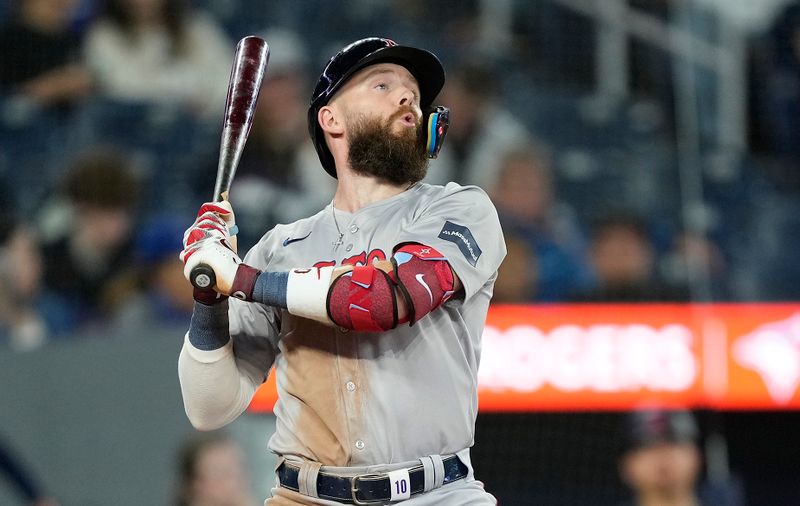 Sep 23, 2024; Toronto, Ontario, CAN; Boston Red Sox shortstop Trevor Story (10) reacts after a high and inside pitch against the Toronto Blue Jays during the ninth inning at Rogers Centre. Mandatory Credit: John E. Sokolowski-Imagn Images