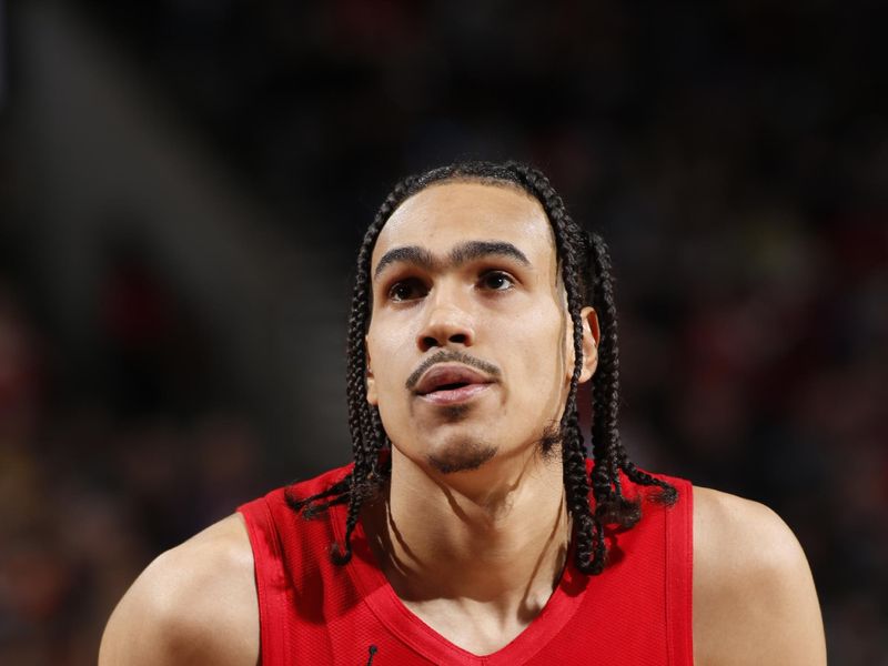 PORTLAND, OR - MARCH 23: Dalano Banton #5 of the Portland Trail Blazers shoots a free throw during the game against the Denver Nuggets on March 23, 2024 at the Moda Center Arena in Portland, Oregon. NOTE TO USER: User expressly acknowledges and agrees that, by downloading and or using this photograph, user is consenting to the terms and conditions of the Getty Images License Agreement. Mandatory Copyright Notice: Copyright 2024 NBAE (Photo by Cameron Browne/NBAE via Getty Images)