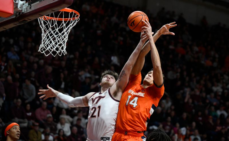 Jan 28, 2023; Blacksburg, Virginia, USA; Syracuse Orange center Jesse Edwards (14) battles Virginia Tech Hokies forward Grant Basile (21) for rebound in the second half at Cassell Coliseum. Mandatory Credit: Lee Luther Jr.-USA TODAY Sports