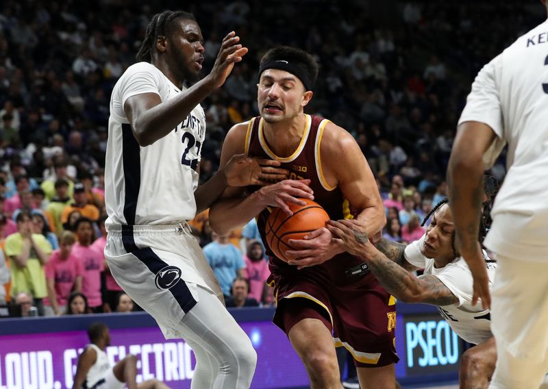 Jan 27, 2024; University Park, Pennsylvania, USA; Minnesota Golden Gophers forward Dawson Garcia (3) is fouled while driving the ball towards the basket during the second half against the Penn State Nittany Lions at Bryce Jordan Center. Minnesota defeated Penn State 83-74. Mandatory Credit: Matthew O'Haren-USA TODAY Sports