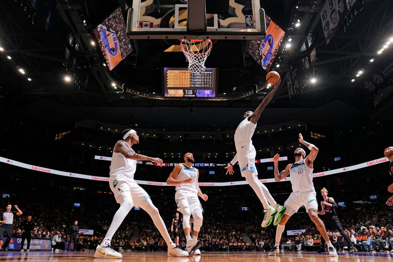 TORONTO, CANADA - NOVEMBER 21: Julius Randle #30 of the Minnesota Timberwolves grabs the rebound during the game against the Toronto Raptors on November 21, 2024 at the Scotiabank Arena in Toronto, Ontario, Canada.  NOTE TO USER: User expressly acknowledges and agrees that, by downloading and or using this Photograph, user is consenting to the terms and conditions of the Getty Images License Agreement.  Mandatory Copyright Notice: Copyright 2024 NBAE (Photo by Mark Blinch/NBAE via Getty Images)