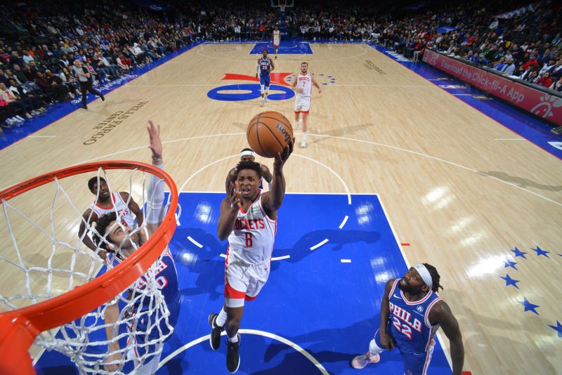 PHILADELPHIA, PA - JANUARY 15: Jae'Sean Tate #8 of the Houston Rockets drives to the basket during the game against the Philadelphia 76ers on January 15, 2024 at the Wells Fargo Center in Philadelphia, Pennsylvania NOTE TO USER: User expressly acknowledges and agrees that, by downloading and/or using this Photograph, user is consenting to the terms and conditions of the Getty Images License Agreement. Mandatory Copyright Notice: Copyright 2024 NBAE (Photo by Jesse D. Garrabrant/NBAE via Getty Images)