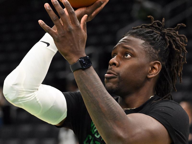 BOSTON, MASSACHUSETTS - JANUARY 30: Jrue Holiday #4 of the Boston Celtics warms up before a game against the Indiana Pacers at the TD Garden on January 30, 2024 in Boston, Massachusetts. NOTE TO USER: User expressly acknowledges and agrees that, by downloading and or using this photograph, User is consenting to the terms and conditions of the Getty Images License Agreement. (Photo by Brian Fluharty/Getty Images)