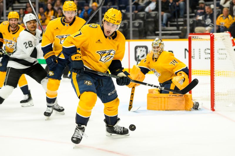 Nov 4, 2024; Nashville, Tennessee, USA;  Nashville Predators defenseman Marc Del Gaizo (7) clears the puck against the Los Angeles Kings during the second period at Bridgestone Arena. Mandatory Credit: Steve Roberts-Imagn Images