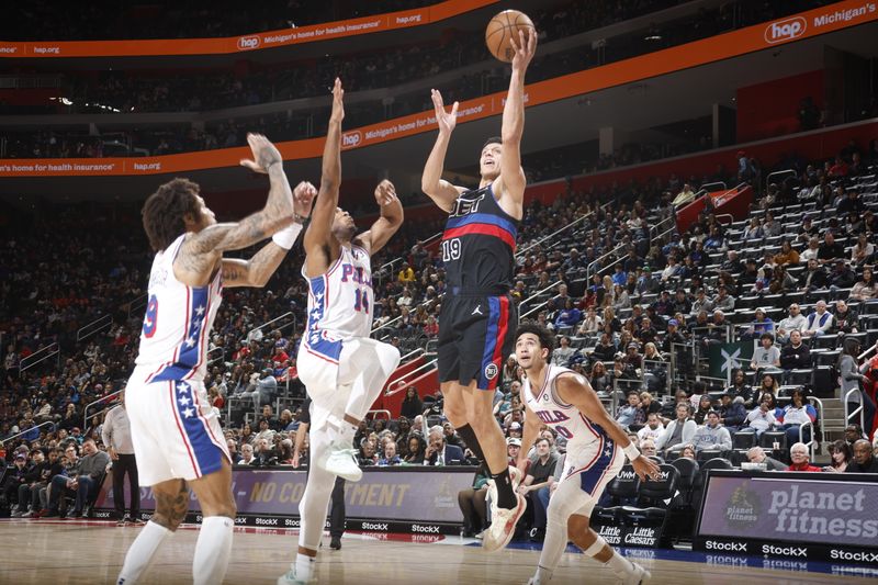 DETROIT, MI - NOVEMBER 30:  Simone Fontecchio #19 of the Detroit Pistons shoots the ball during the game against the Philadelphia 76ers  during a regular season game on November 30, 2024 at Little Caesars Arena in Detroit, Michigan. NOTE TO USER: User expressly acknowledges and agrees that, by downloading and/or using this photograph, User is consenting to the terms and conditions of the Getty Images License Agreement. Mandatory Copyright Notice: Copyright 2024 NBAE (Photo by Brian Sevald/NBAE via Getty Images)