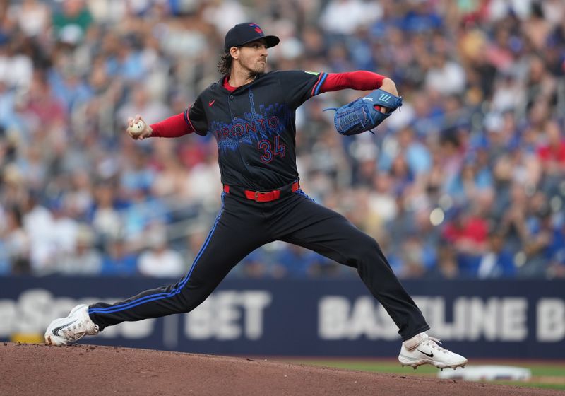 Jun 19, 2024; Toronto, Ontario, CAN; Toronto Blue Jays starting pitcher Kevin Gausman (34) throws a pitch against the Boston Red Sox during the first inning at Rogers Centre. Mandatory Credit: Nick Turchiaro-USA TODAY Sports