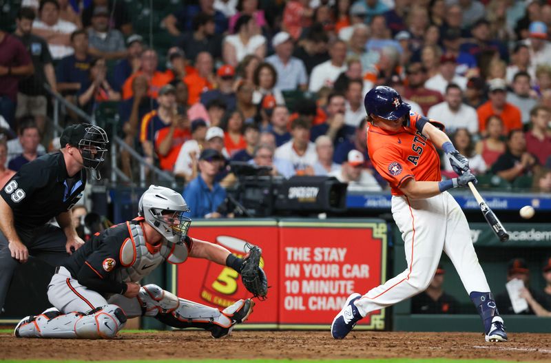 Jun 21, 2024; Houston, Texas, USA; Houston Astros center fielder Jake Meyers (6) hits a three run home run against the Baltimore Orioles in the fifth inning at Minute Maid Park. Mandatory Credit: Thomas Shea-USA TODAY Sports