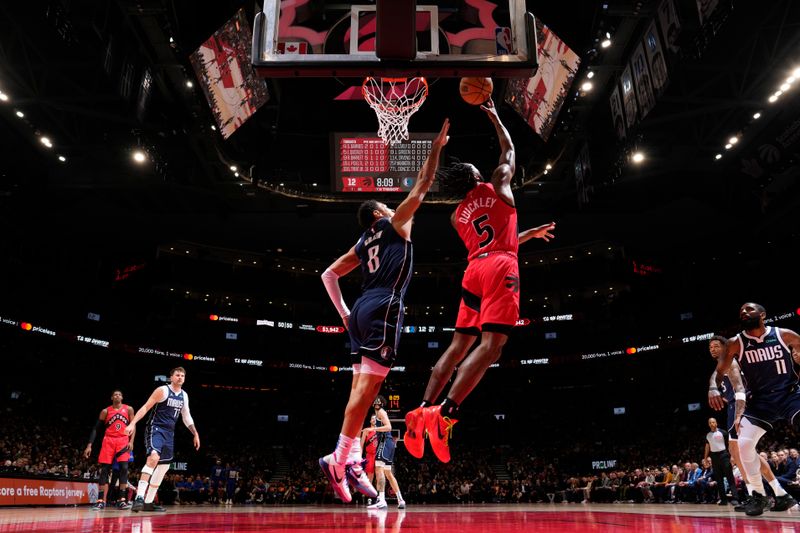 TORONTO, CANADA - FEBRUARY 28: Immanuel Quickley #5 of the Toronto Raptors shoots the ball during the game against the Dallas Mavericks on February 28, 2024 at the Scotiabank Arena in Toronto, Ontario, Canada.  NOTE TO USER: User expressly acknowledges and agrees that, by downloading and or using this Photograph, user is consenting to the terms and conditions of the Getty Images License Agreement.  Mandatory Copyright Notice: Copyright 2024 NBAE (Photo by Mark Blinch/NBAE via Getty Images)