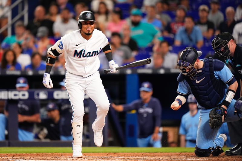 Jun 20, 2023; Miami, Florida, USA; Miami Marlins second baseman Luis Arraez (3) reacts to a pitch against the Toronto Blue Jays during the fourth inning at loanDepot Park. Mandatory Credit: Rich Storry-USA TODAY Sports