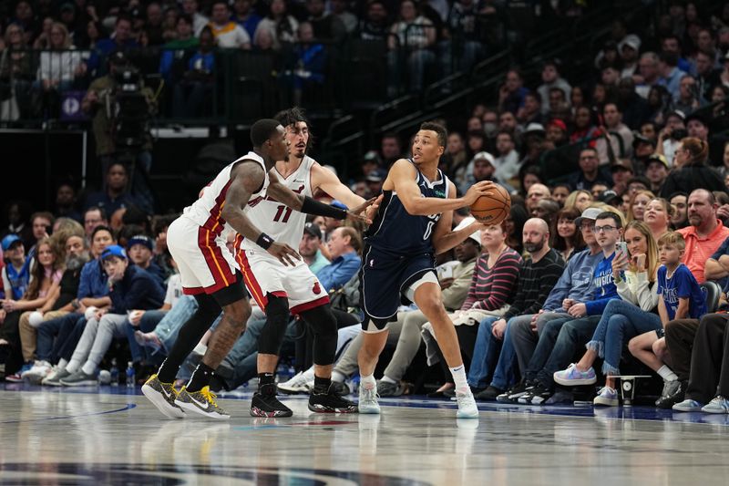 DALLAS, TX - MARCH 7: Dante Exum #0 of the Dallas Mavericks handles the ball during the game against the Miami Heat on March 7, 2024 at the American Airlines Center in Dallas, Texas. NOTE TO USER: User expressly acknowledges and agrees that, by downloading and or using this photograph, User is consenting to the terms and conditions of the Getty Images License Agreement. Mandatory Copyright Notice: Copyright 2024 NBAE (Photo by Glenn James/NBAE via Getty Images)