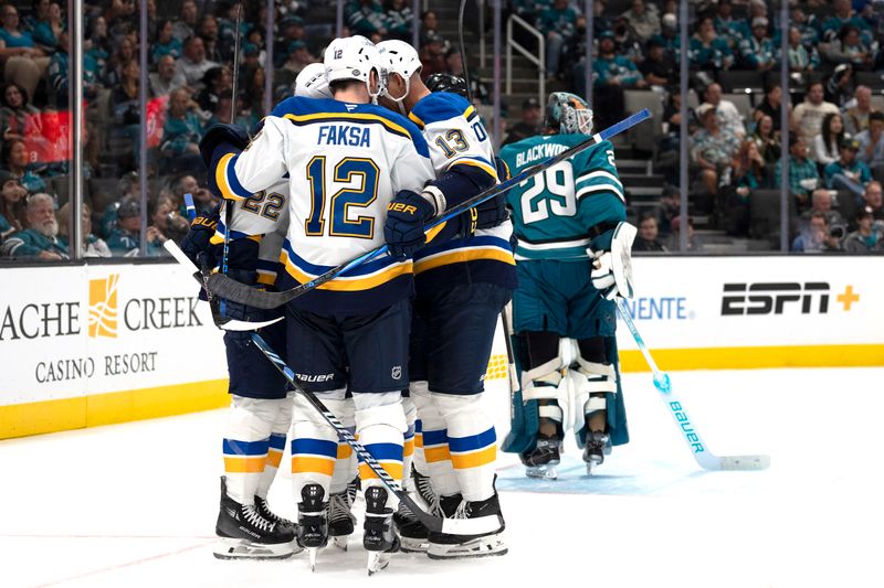 Oct 10, 2024; San Jose, California, USA;  St. Louis Blues center Radek Faksa (12) celebrates with his teammates during the third period against the San Jose Sharks at SAP Center at San Jose. Mandatory Credit: Stan Szeto-Imagn Images