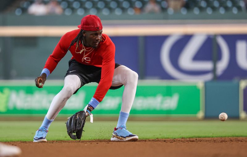 Jun 18, 2023; Houston, Texas, USA; Cincinnati Reds shortstop Elly De La Cruz (44) fields ground balls before the game against the Houston Astros at Minute Maid Park. Mandatory Credit: Troy Taormina-USA TODAY Sports