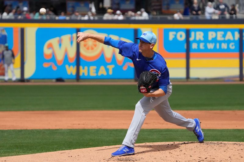 Mar 24, 2024; Peoria, Arizona, USA; Chicago Cubs starting pitcher Kyle Hendricks (28) throws against the Seattle Mariners in the first inning at Peoria Sports Complex. Mandatory Credit: Rick Scuteri-USA TODAY Sports