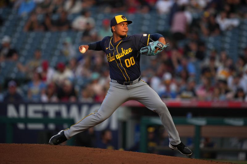 Jun 17, 2024; Anaheim, California, USA; Milwaukee Brewers starting pitcher Carlos F. Rodriguez (0) throws in the third inning against the Los Angeles Angels at Angel Stadium. Mandatory Credit: Kirby Lee-USA TODAY Sports