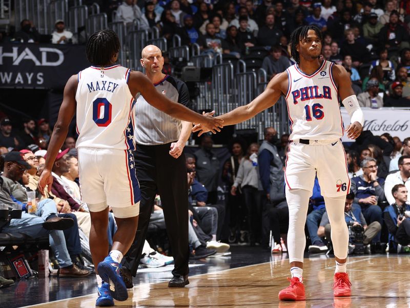 WASHINGTON, DC -? FEBRUARY 10: Tyrese Maxey #0 high fives Ricky Council IV #16 of the Philadelphia 76ers during the game against the Washington Wizards on February 10, 2024 at Capital One Arena in Washington, DC. NOTE TO USER: User expressly acknowledges and agrees that, by downloading and or using this Photograph, user is consenting to the terms and conditions of the Getty Images License Agreement. Mandatory Copyright Notice: Copyright 2024 NBAE (Photo by Kenny Giarla/NBAE via Getty Images)