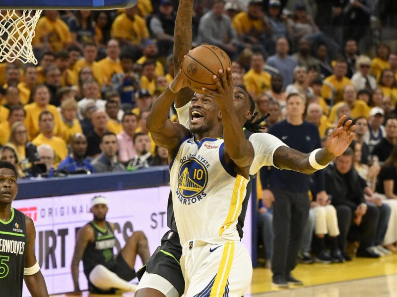 SAN FRANCISCO, CA - MAY 10: Jimmy Butler #10 of the Golden State Warriors drives to the basket during the game against the Minnesota Timberwolves during round 2 game 3 of the 2025 NBA Playoffs on May 10, 2025 at Chase Center in San Francisco, California. NOTE TO USER: User expressly acknowledges and agrees that, by downloading and or using this photograph, user is consenting to the terms and conditions of Getty Images License Agreement. Mandatory Copyright Notice: Copyright 2025 NBAE (Photo by David Dow/NBAE via Getty Images)