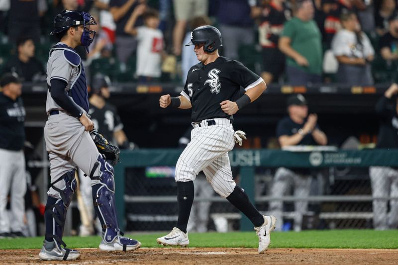 Aug 9, 2023; Chicago, Illinois, USA; Chicago White Sox first baseman Andrew Vaughn (25) scores against the New York Yankees during the eight inning at Guaranteed Rate Field. Mandatory Credit: Kamil Krzaczynski-USA TODAY Sports