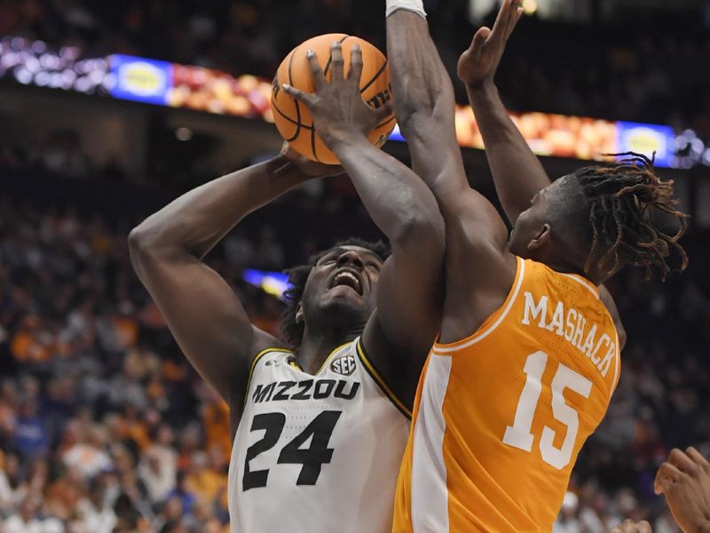 Mar 10, 2023; Nashville, TN, USA;  Tennessee Volunteers guard Jahmai Mashack (15) blocks the shot of Missouri Tigers guard Kobe Brown (24) during the second half at Bridgestone Arena. Mandatory Credit: Steve Roberts-USA TODAY Sports