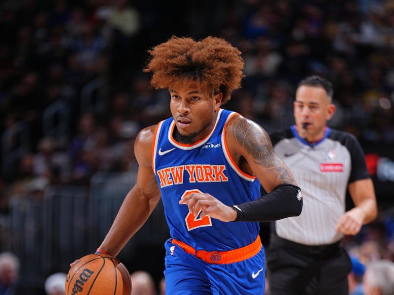 DENVER, CO - NOVEMBER 25: Miles McBride #2 of the New York Knicks dribbles the ball during the game against the Denver Nuggets on November 25, 2024 at Ball Arena in Denver, Colorado. NOTE TO USER: User expressly acknowledges and agrees that, by downloading and/or using this Photograph, user is consenting to the terms and conditions of the Getty Images License Agreement. Mandatory Copyright Notice: Copyright 2024 NBAE (Photo by Garrett Ellwood/NBAE via Getty Images)