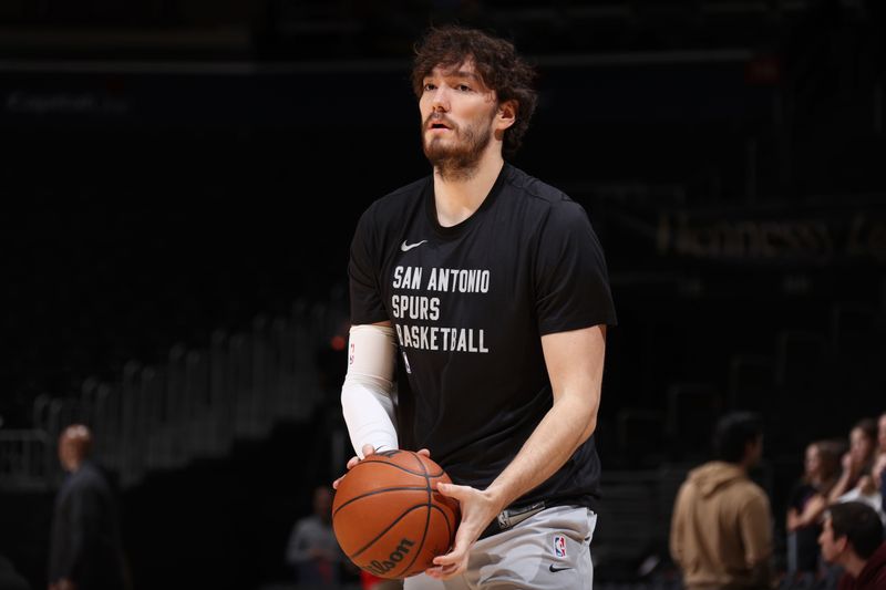 WASHINGTON, DC -? JANUARY 20: Cedi Osman #16 of the San Antonio Spurs warms up before the game against the Washington Wizards on January 20, 2024 at Capital One Arena in Washington, DC. NOTE TO USER: User expressly acknowledges and agrees that, by downloading and or using this Photograph, user is consenting to the terms and conditions of the Getty Images License Agreement. Mandatory Copyright Notice: Copyright 2024 NBAE (Photo by Stephen Gosling/NBAE via Getty Images)