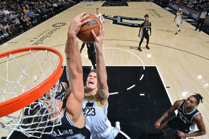 SAN ANTONIO, TX - NOVEMBER 9: Zach Collins #23 of the San Antonio Spurs block during the game against the Utah Jazz on November 9, 2024 at the Frost Bank Center in San Antonio, Texas. NOTE TO USER: User expressly acknowledges and agrees that, by downloading and or using this photograph, user is consenting to the terms and conditions of the Getty Images License Agreement. Mandatory Copyright Notice: Copyright 2024 NBAE (Photos by Michael Gonzales/NBAE via Getty Images)