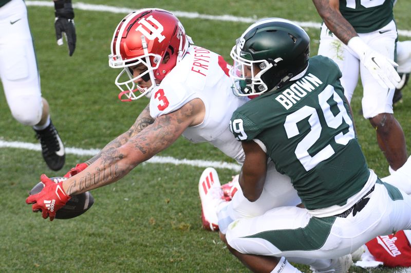 Nov 14, 2020; East Lansing, Michigan, USA; Indiana Hoosiers wide receiver Ty Fryfogle (3) runs for a touchdown as Michigan State Spartans cornerback Shakur Brown (29) attempts to tackle during the first quarter at Spartan Stadium. Mandatory Credit: Tim Fuller-USA TODAY Sports