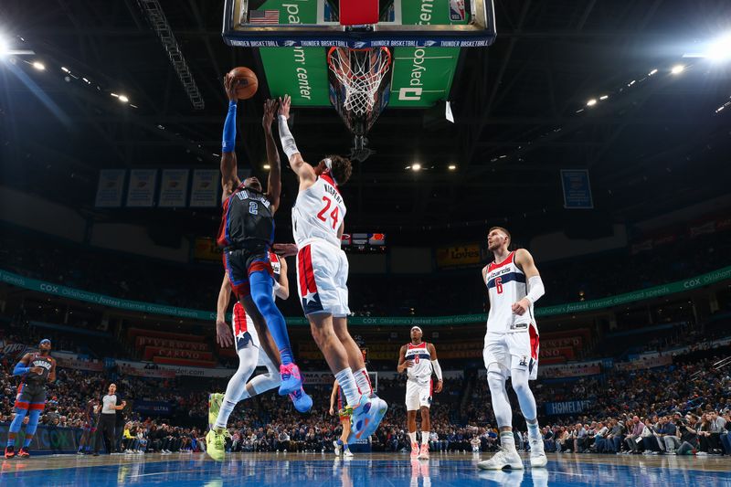 OKLAHOMA CITY, OK - JANUARY 6:  Shai Gilgeous-Alexander #2 of the Oklahoma City Thunder drives to the basket during the game against the  Washington Wizards on January 6, 2023 at Paycom Arena in Oklahoma City, Oklahoma. NOTE TO USER: User expressly acknowledges and agrees that, by downloading and or using this photograph, User is consenting to the terms and conditions of the Getty Images License Agreement. Mandatory Copyright Notice: Copyright 2023 NBAE (Photo by Zach Beeker/NBAE via Getty Images)