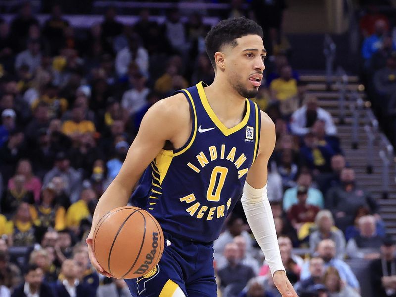 INDIANAPOLIS, INDIANA - FEBRUARY 11: Tyrese Haliburton #0 of the Indiana Pacers brings the ball up court against the New York Knicks during the first half at Gainbridge Fieldhouse on February 11, 2025 in Indianapolis, Indiana. NOTE TO USER: User expressly acknowledges and agrees that, by downloading and or using this photograph, User is consenting to the terms and conditions of the Getty Images License Agreement. (Photo by Justin Casterline/Getty Images)