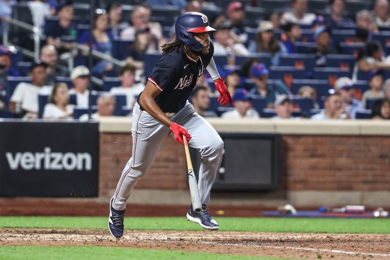 Jul 9, 2024; New York City, New York, USA;  Washington Nationals left fielder James Wood (29) hits a single in the eighth inning against the New York Mets at Citi Field. Mandatory Credit: Wendell Cruz-USA TODAY Sports