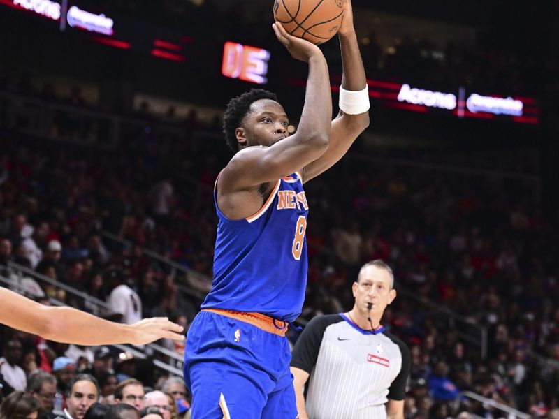 ATLANTA, GA - November 6:  OG Anunoby #8 of the New York Knicks shoots a three point basket during the game against the Atlanta Hawks on November 6, 2024 at State Farm Arena in Atlanta, Georgia.  NOTE TO USER: User expressly acknowledges and agrees that, by downloading and/or using this Photograph, user is consenting to the terms and conditions of the Getty Images License Agreement. Mandatory Copyright Notice: Copyright 2024 NBAE (Photo by Adam Hagy/NBAE via Getty Images)