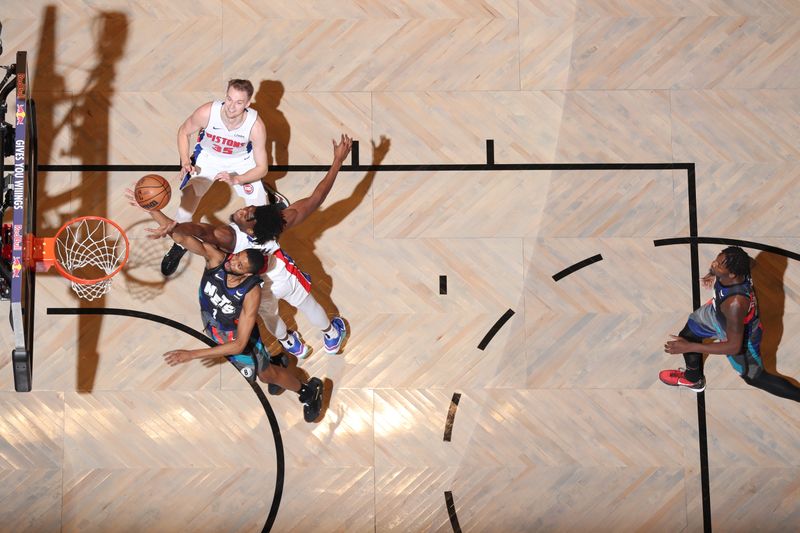 BROOKLYN, NY - APRIL 6: Mikal Bridges #1 of the Brooklyn Nets goes up for the rebound during the game against the Detroit Pistons on April 6, 2024 at Barclays Center in Brooklyn, New York. NOTE TO USER: User expressly acknowledges and agrees that, by downloading and or using this Photograph, user is consenting to the terms and conditions of the Getty Images License Agreement. Mandatory Copyright Notice: Copyright 2024 NBAE (Photo by Nathaniel S. Butler/NBAE via Getty Images)