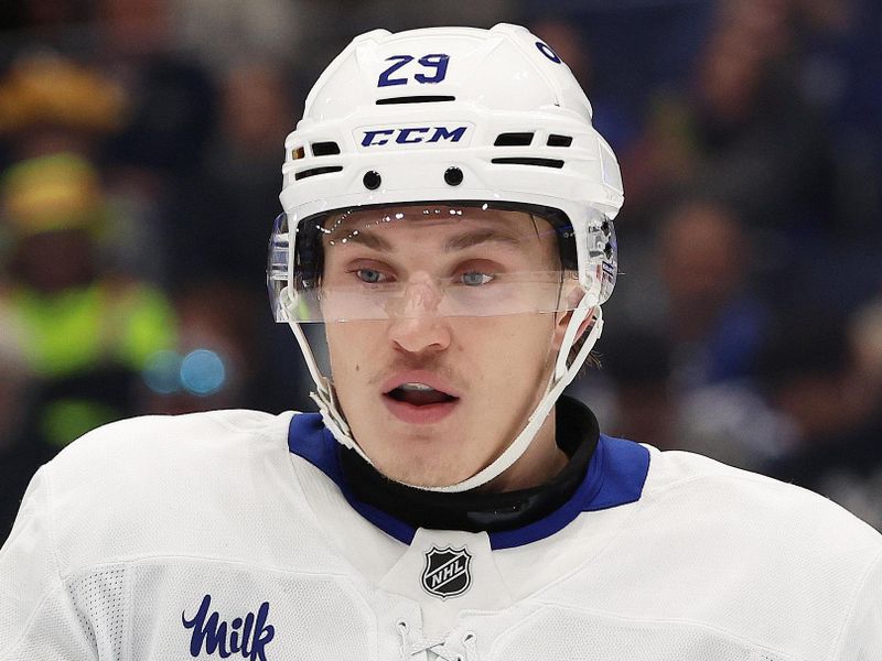 Nov 30, 2024; Tampa, Florida, USA; Toronto Maple Leafs right wing Pontus Holmberg (29) against the Tampa Bay Lightning during the third period at Amalie Arena. Mandatory Credit: Kim Klement Neitzel-Imagn Images