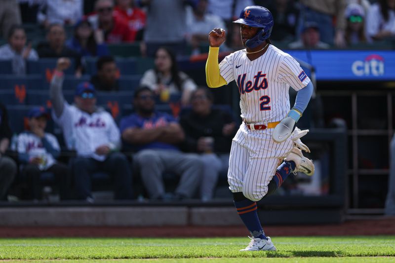 Apr 20, 2025; New York City, New York, USA; New York Mets shortstop Luisangel Acuna (2) scores on an RBI double by right fielder Tyrone Taylor (not pictured) during the eighth inning against the St. Louis Cardinals at Citi Field. Mandatory Credit: Vincent Carchietta-Imagn Images