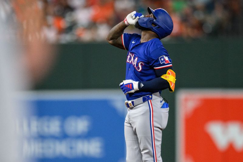 Jun 30, 2024; Baltimore, Maryland, USA; Texas Rangers outfielder Adolis García (53) reacts after hitting a double during the fifth inning against the Baltimore Orioles at Oriole Park at Camden Yards. Mandatory Credit: Reggie Hildred-USA TODAY Sports