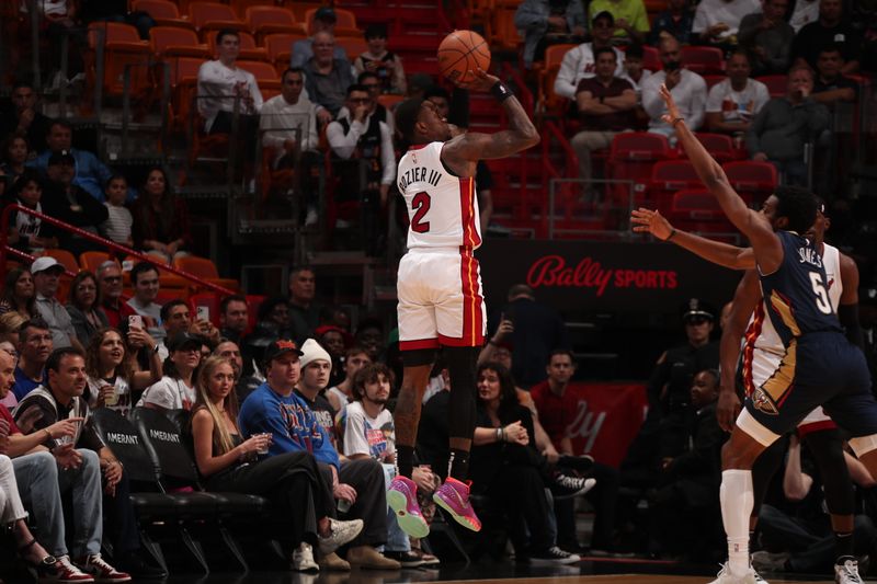 MIAMI, FL - MARCH 22: Terry Rozier #2 of the Miami Heat shoots a three point basket during the game against the New Orleans Pelicans on March 22, 2024 at Kaseya Center in Miami, Florida. NOTE TO USER: User expressly acknowledges and agrees that, by downloading and or using this Photograph, user is consenting to the terms and conditions of the Getty Images License Agreement. Mandatory Copyright Notice: Copyright 2024 NBAE (Photo by Issac Baldizon/NBAE via Getty Images)