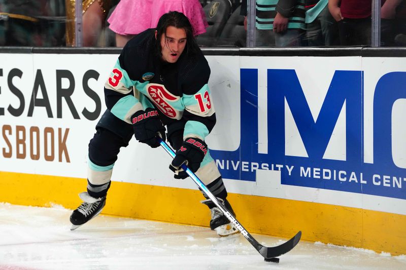 Mar 21, 2024; Las Vegas, Nevada, USA; Seattle Kraken left wing Brandon Tanev (13) warms up before a game against the Vegas Golden Knights at T-Mobile Arena. Mandatory Credit: Stephen R. Sylvanie-USA TODAY Sports