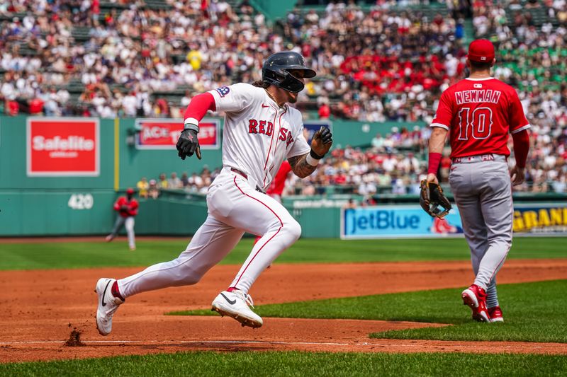 Jun 4, 2025; Boston, Massachusetts, USA; Boston Red Sox outfielder Jarren Duran (16) rounds third base to score against the Los Angeles Angels in the first inning at Fenway Park. Mandatory Credit: David Butler II-Imagn Images