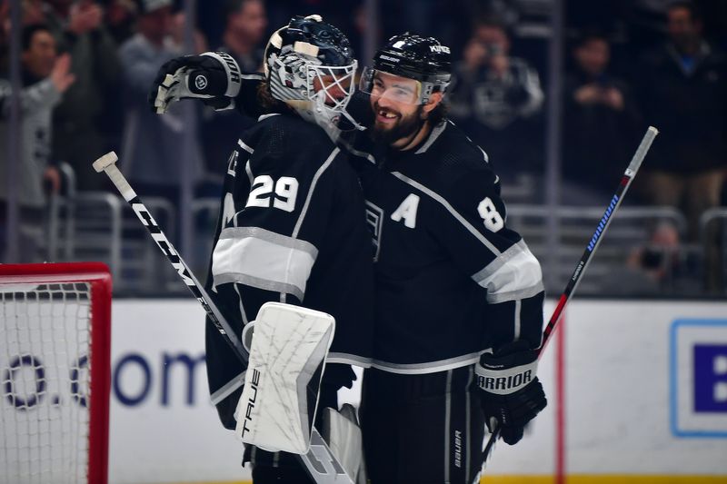 Feb 13, 2023; Los Angeles, California, USA; Los Angeles Kings defenseman Drew Doughty (8) and goaltender Pheonix Copley (29) celebrate the victory against the Buffalo Sabres  at Crypto.com Arena. Mandatory Credit: Gary A. Vasquez-USA TODAY Sports