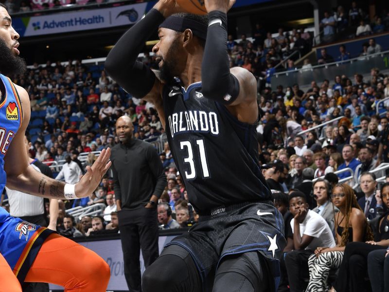 ORLANDO, FL - JANUARY 4: Terrence Ross #31 of the Orlando Magic handles the ball against the Oklahoma City Thunder on January 4, 2023 at Amway Center in Orlando, Florida. NOTE TO USER: User expressly acknowledges and agrees that, by downloading and or using this photograph, User is consenting to the terms and conditions of the Getty Images License Agreement. Mandatory Copyright Notice: Copyright 2023 NBAE (Photo by Fernando Medina/NBAE via Getty Images)