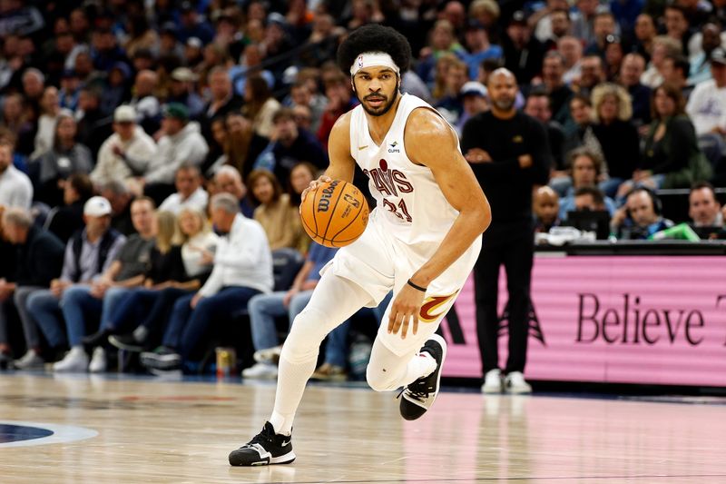 MINNEAPOLIS, MINNESOTA - MARCH 22: Jarrett Allen #31 of the Cleveland Cavaliers drives to the basket against the Minnesota Timberwolves in the third quarter at Target Center on March 22, 2024 in Minneapolis, Minnesota. The Timberwolves defeated the Cavaliers 104-91. NOTE TO USER: User expressly acknowledges and agrees that, by downloading and or using this photograph, User is consenting to the terms and conditions of the Getty Images License Agreement. (Photo by David Berding/Getty Images)