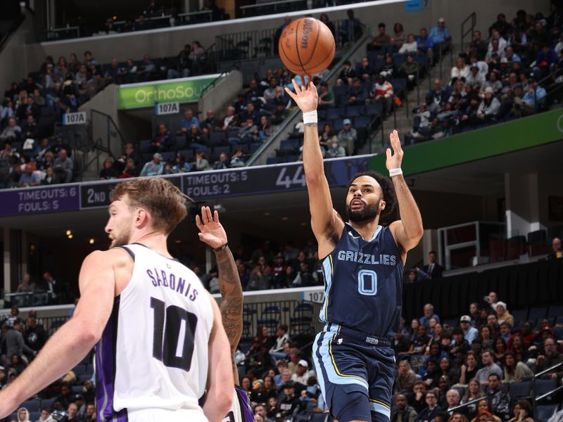 MEMPHIS, TN - JANUARY 29:  Jacob Gilyard #0 of the Memphis Grizzlies shoots the ball during the game against the Sacramento Kings on January 29, 2024 at FedExForum in Memphis, Tennessee. NOTE TO USER: User expressly acknowledges and agrees that, by downloading and or using this photograph, User is consenting to the terms and conditions of the Getty Images License Agreement. Mandatory Copyright Notice: Copyright 2024 NBAE (Photo by Joe Murphy/NBAE via Getty Images)