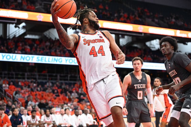 Jan 7, 2025; Syracuse, New York, USA; Syracuse Orange center Eddie Lampkin Jr. (44) saves a ball from going out of bounds in the second half against the Georgia Tech Yellow Jackets at the JMA Wireless Dome. Mandatory Credit: Mark Konezny-Imagn Images