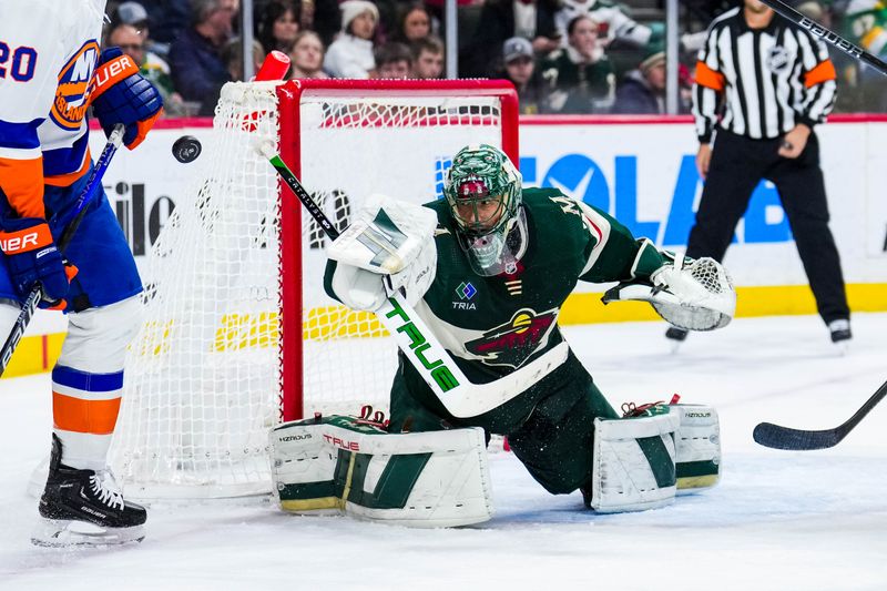 Jan 15, 2024; Saint Paul, Minnesota, USA; Minnesota Wild goaltender Marc-Andre Fleury (29) makes a save during the third period against the New York Islanders at Xcel Energy Center. Mandatory Credit: Brace Hemmelgarn-USA TODAY Sports