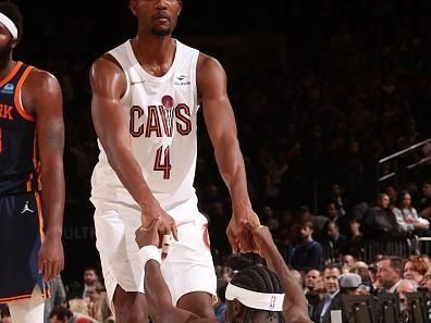 NEW YORK, NY - NOVEMBER 1: Evan Mobley #4 of the Cleveland Cavaliers helps up Caris LeVert #3 during the game against the New York Knicks on November 1, 2023 at Madison Square Garden in New York City, New York.  NOTE TO USER: User expressly acknowledges and agrees that, by downloading and or using this photograph, User is consenting to the terms and conditions of the Getty Images License Agreement. Mandatory Copyright Notice: Copyright 2023 NBAE  (Photo by Nathaniel S. Butler/NBAE via Getty Images)