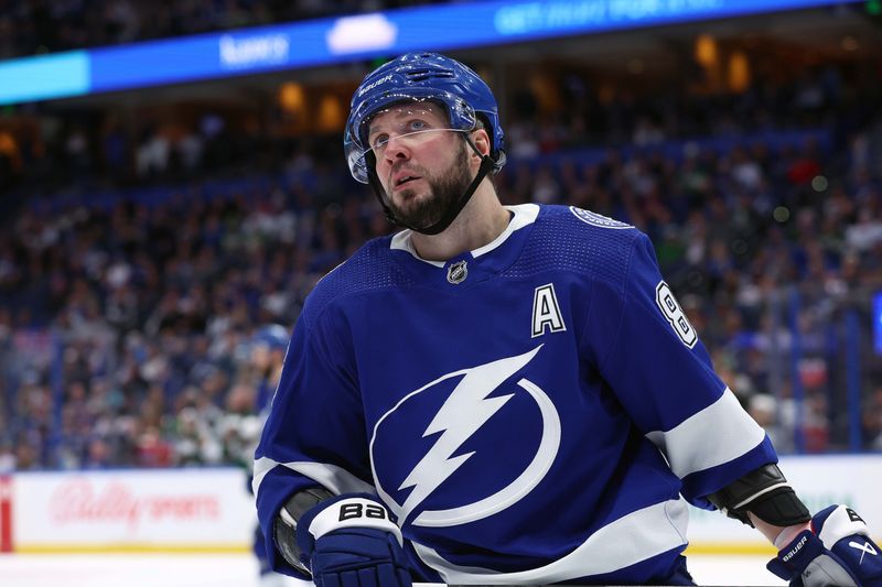 Jan 18, 2024; Tampa, Florida, USA; Tampa Bay Lightning right wing Nikita Kucherov (86) looks on against the Minnesota Wild during the third period at Amalie Arena. Mandatory Credit: Kim Klement Neitzel-USA TODAY Sports