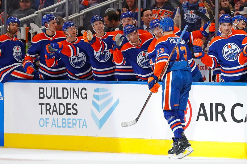 Oct 7, 2022; Edmonton, Alberta, CAN; The Edmonton Oilers celebrate a goal by forward Jesse Puljujarvi (13) against the Seattle Kraken during the third period at Rogers Place. Mandatory Credit: Perry Nelson-USA TODAY Sports